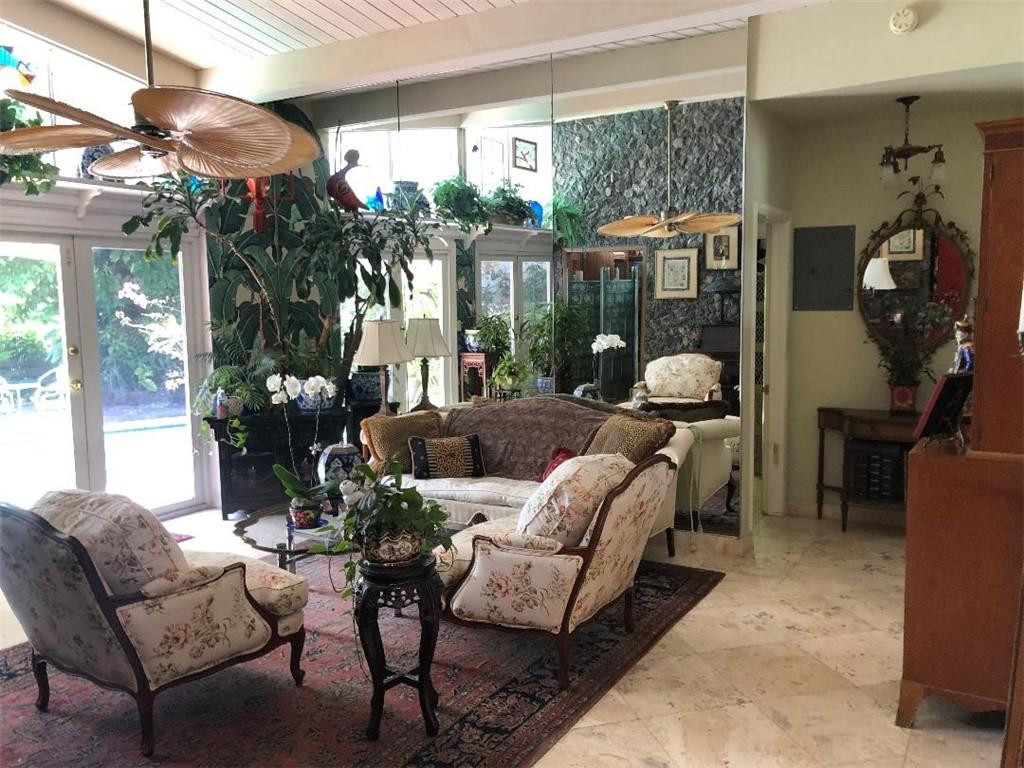 2713 Northeast 30th Avenue Lighthouse Point, FL 33064 - Photo 2 of 22 a outdoor living space with furniture
