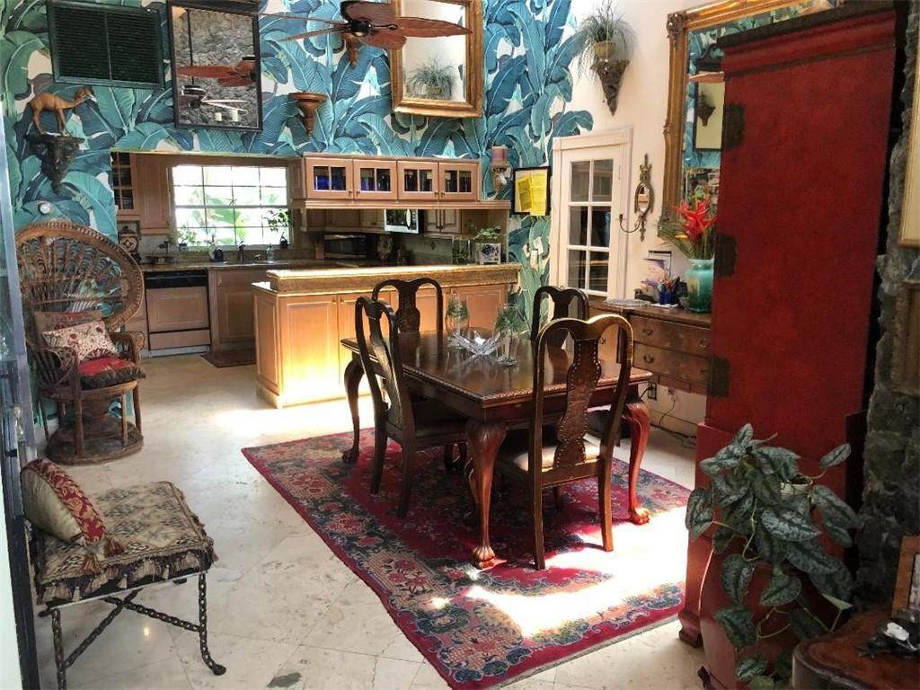 2713 Northeast 30th Avenue Lighthouse Point, FL 33064 - Photo 7 of 22 a view of a chairs and tables in the patio