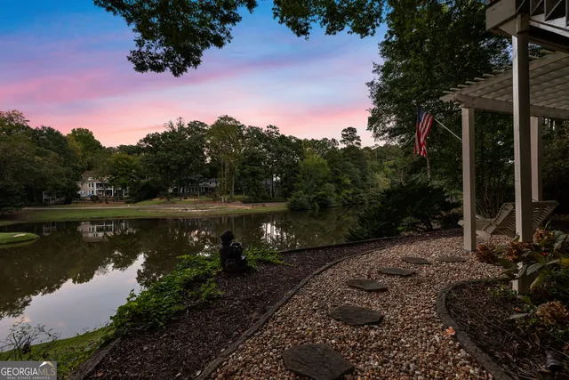 a wooden bench sitting on top of a wooden floor