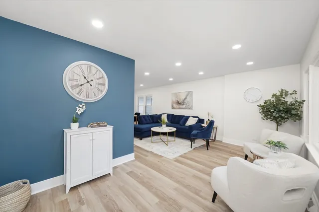 a living room with furniture and a table