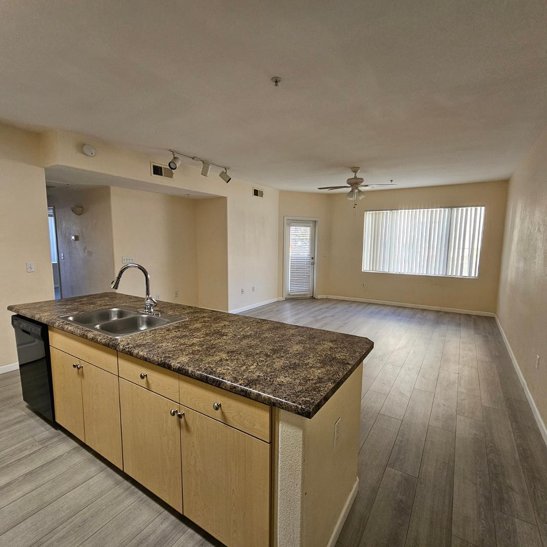 18416 North Cave Creek Road, Unit 2057 Phoenix, AZ 85032 - Photo 6 of 11 a view of a kitchen with sink and dishwasher