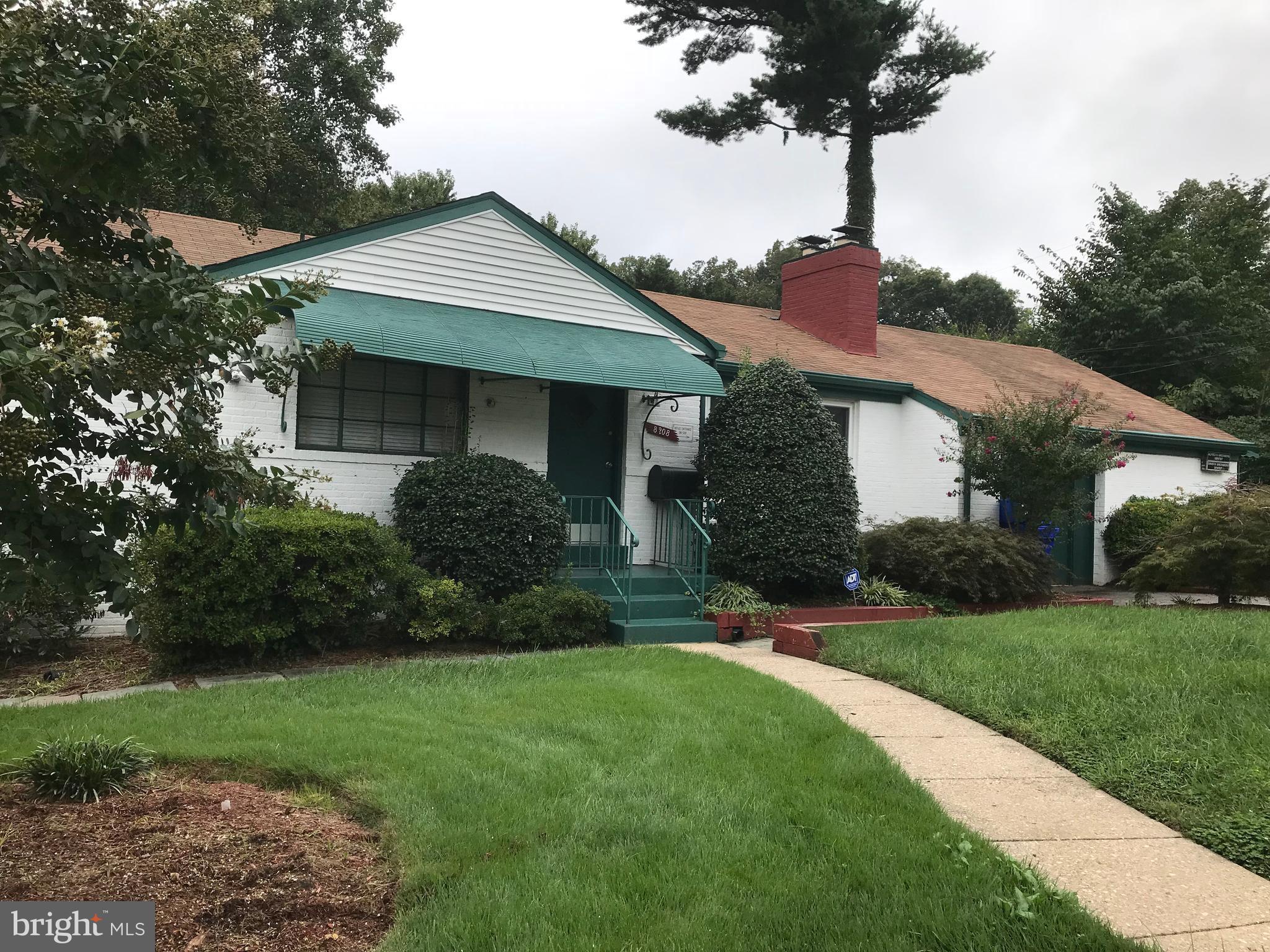 8208 Grubb Road Chevy Chase, MD 20815 - Photo 1 of 10 Professionally landscaped for lovely curb appeal