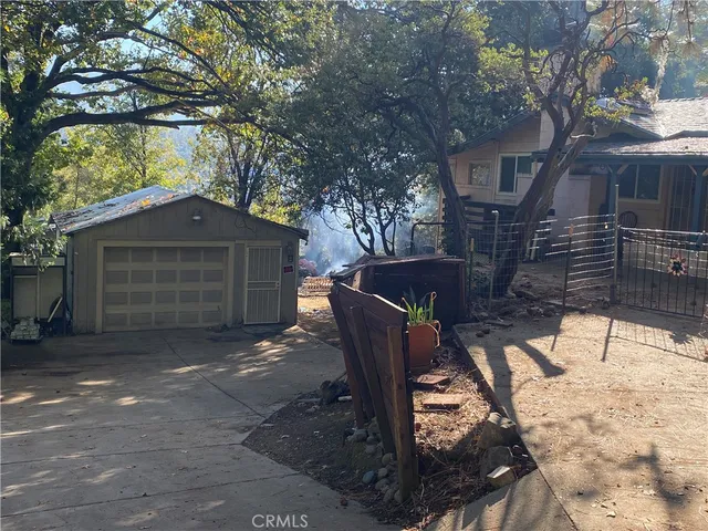 a house with trees in front of it