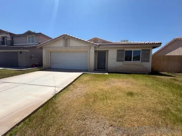 a front view of house with yard