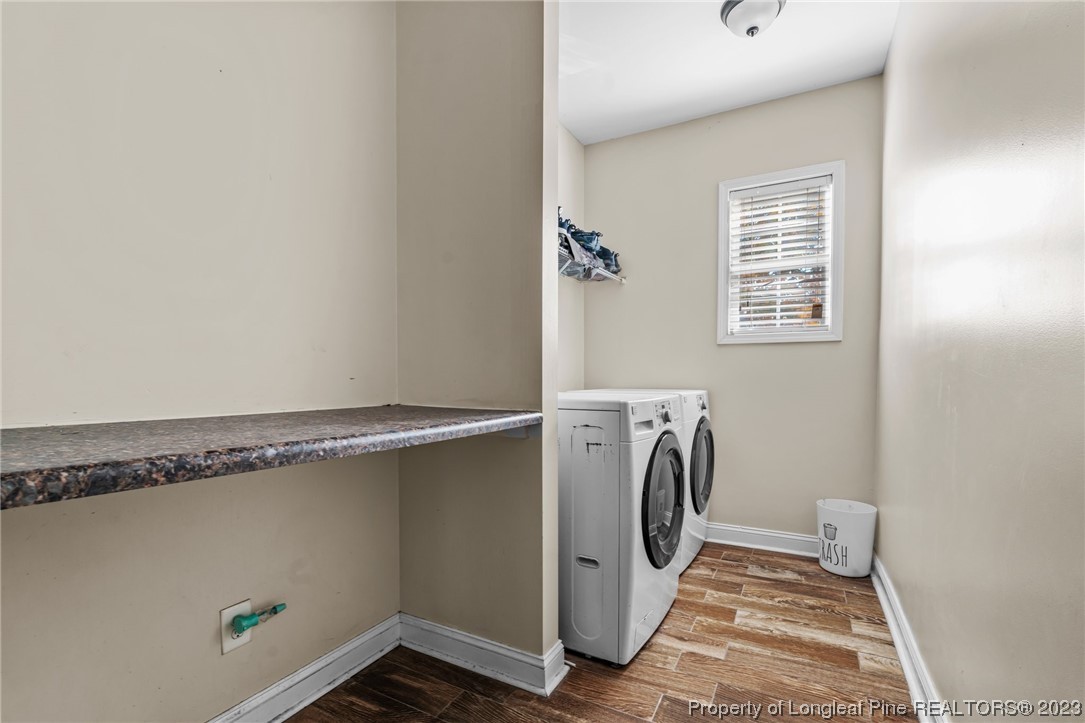 42 Annapolis Road Cameron, NC 28326 - Photo 31 of 43 a utility room with dryer and washer