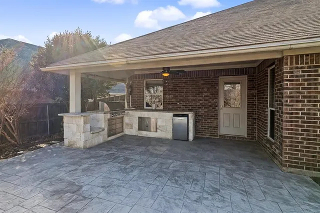 a view of a backyard with plants
