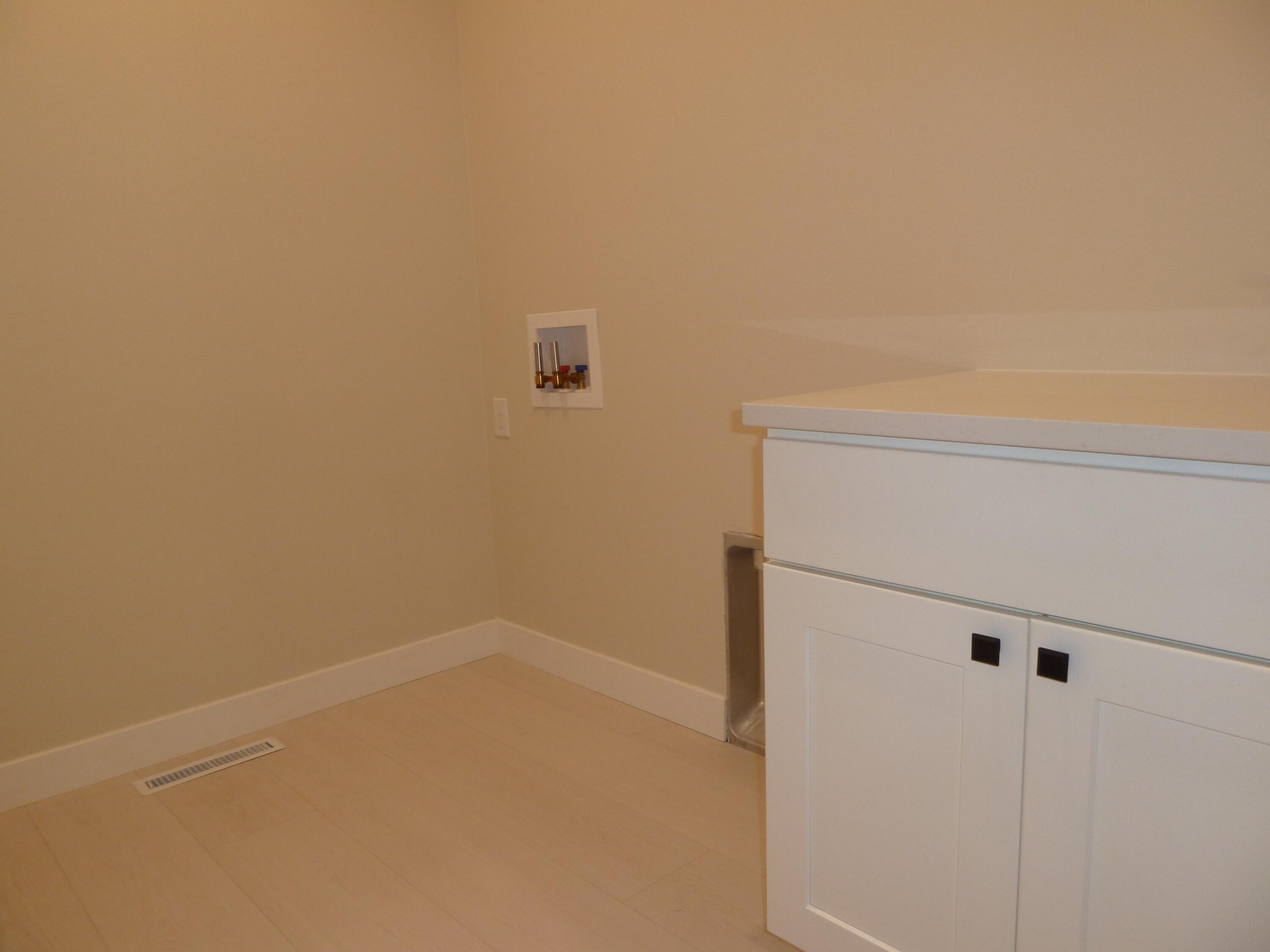 717 Tamarack Trail Holmen, WI 54636 - Photo 36 of 52 Main level Laundry