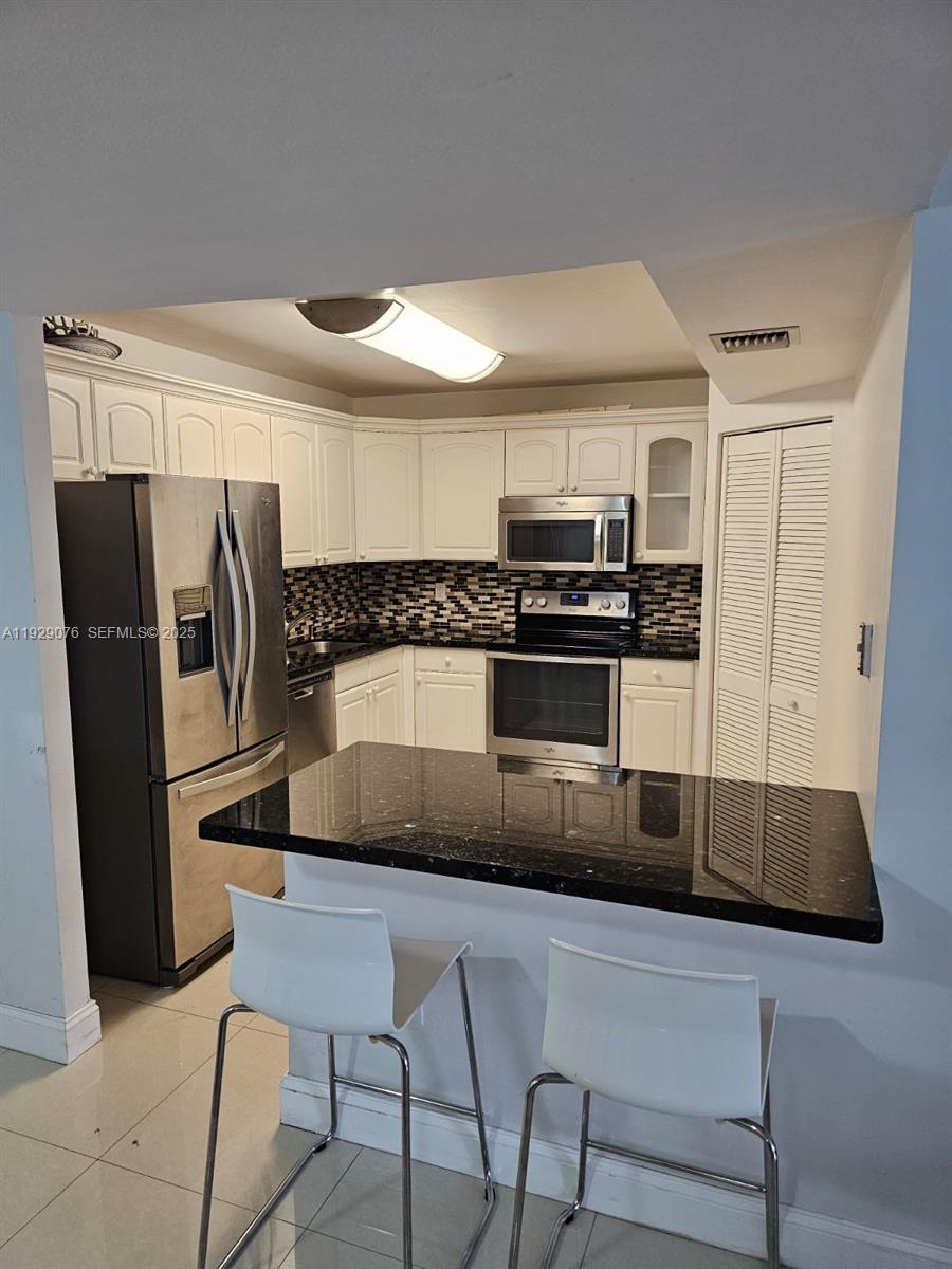 9273 Collins Avenue, Unit 408 Surfside, FL 33154 - Photo 3 of 30