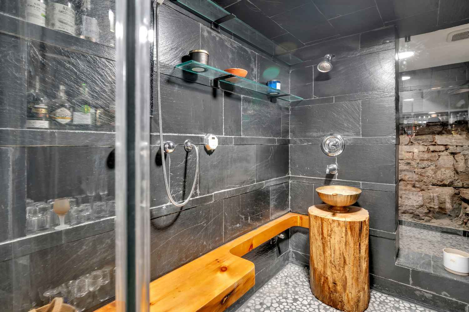 Undisclosed Address Manhattan, NY 10012 - Photo 18 of 36 a bathroom with a shower and a sink