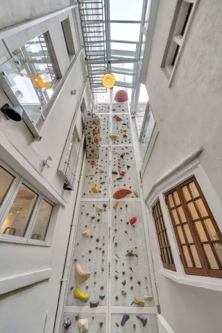 a bed room with a bed and a window