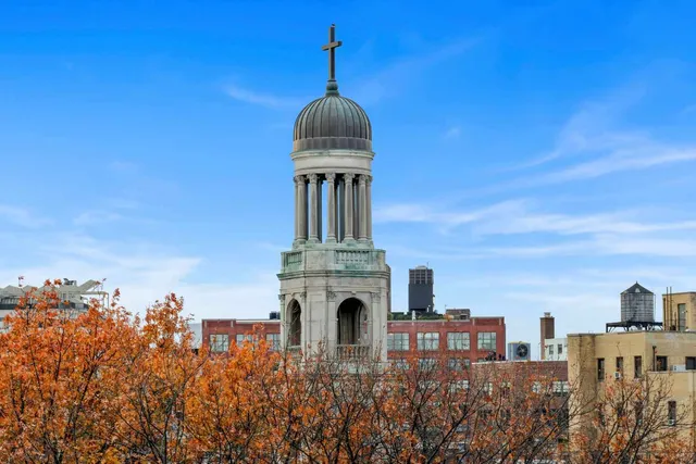 a view of a dining room with furniture water and windows