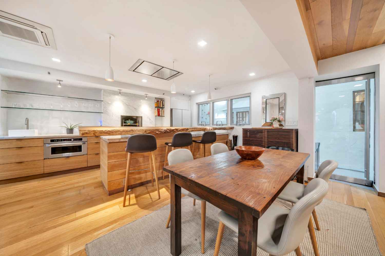 Undisclosed Address Manhattan, NY 10012 - Photo 6 of 36 a view of a dining room with furniture