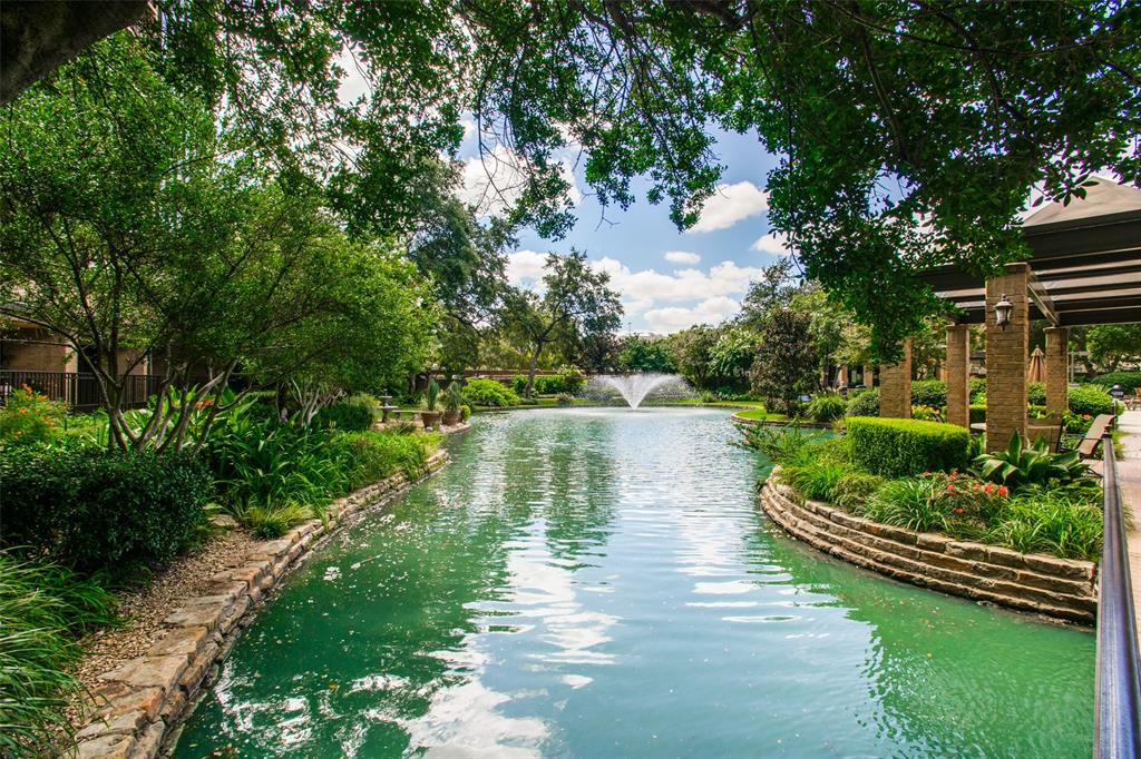 5200 Keller Springs Road, Unit 824 Dallas, TX 75248 - Photo 24 of 26 a view of a lake with a yard