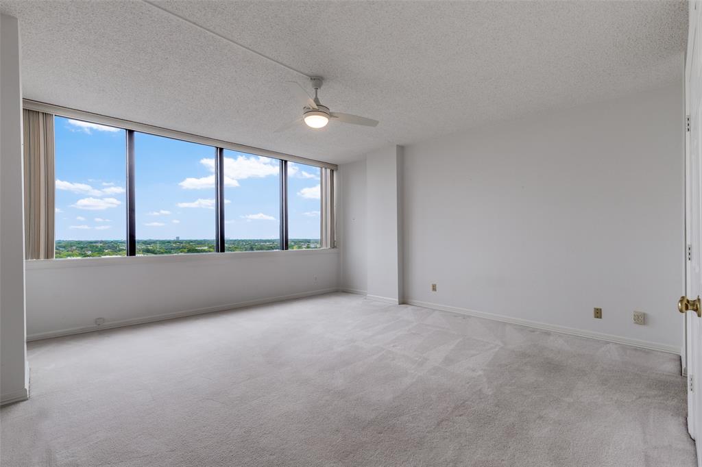 5200 Keller Springs Road, Unit 824 Dallas, TX 75248 - Photo 6 of 26 a view of an empty room with a window
