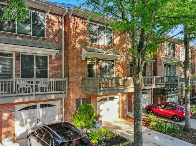 a front view of a house with street