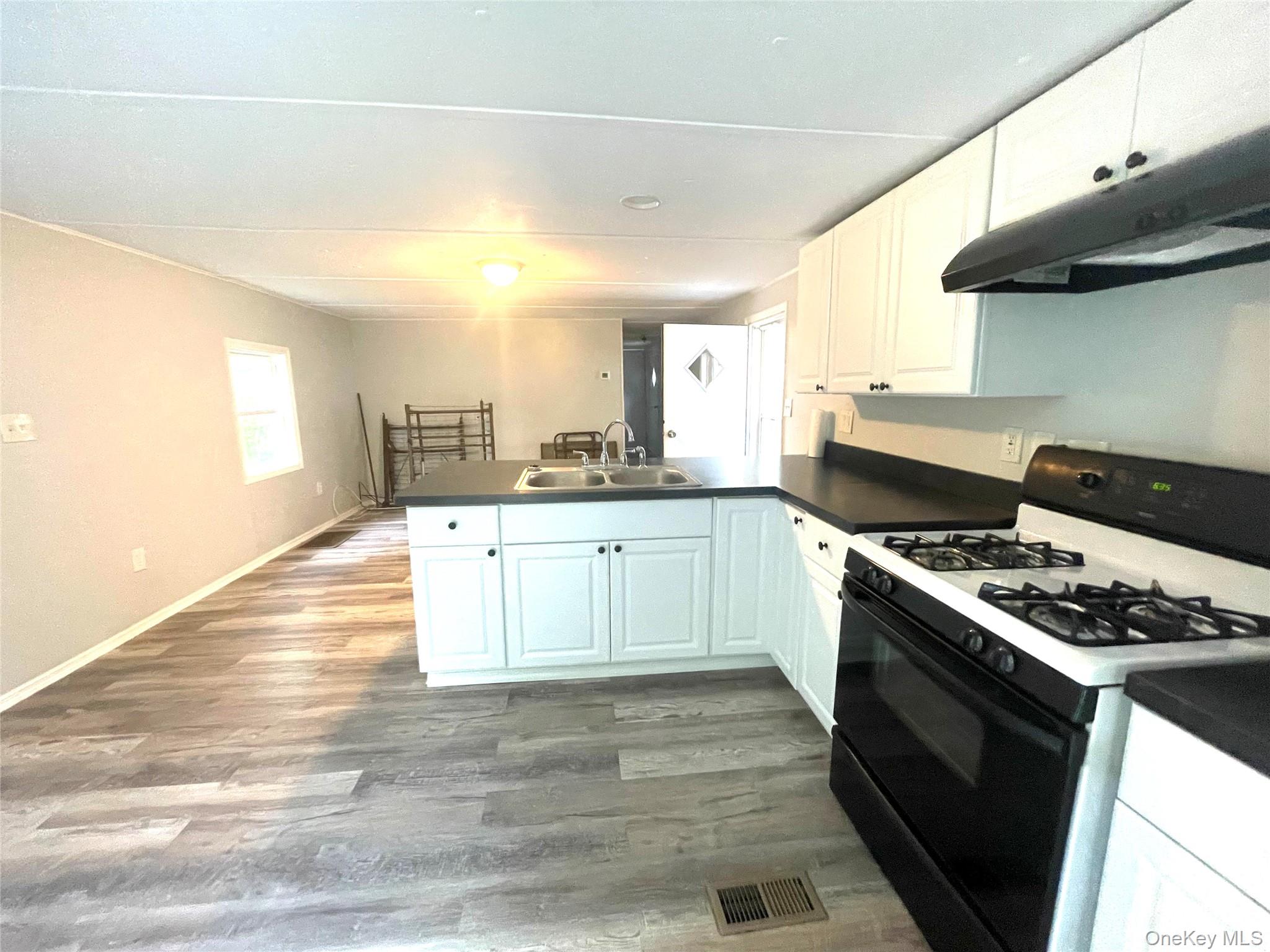 95 New Hackensack Road, Unit 45 Wappingers Falls, NY 12590 - Photo 9 of 17 Kitchen into Living Room