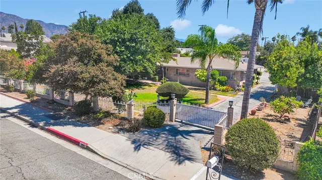 a view of a park with swings and slides