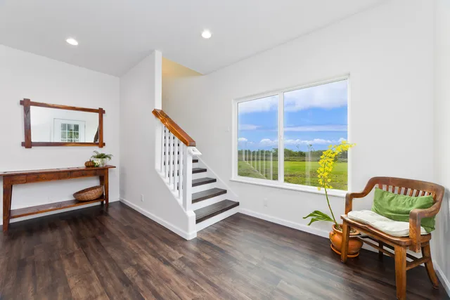 a white toilet sitting next to a bathroom sink