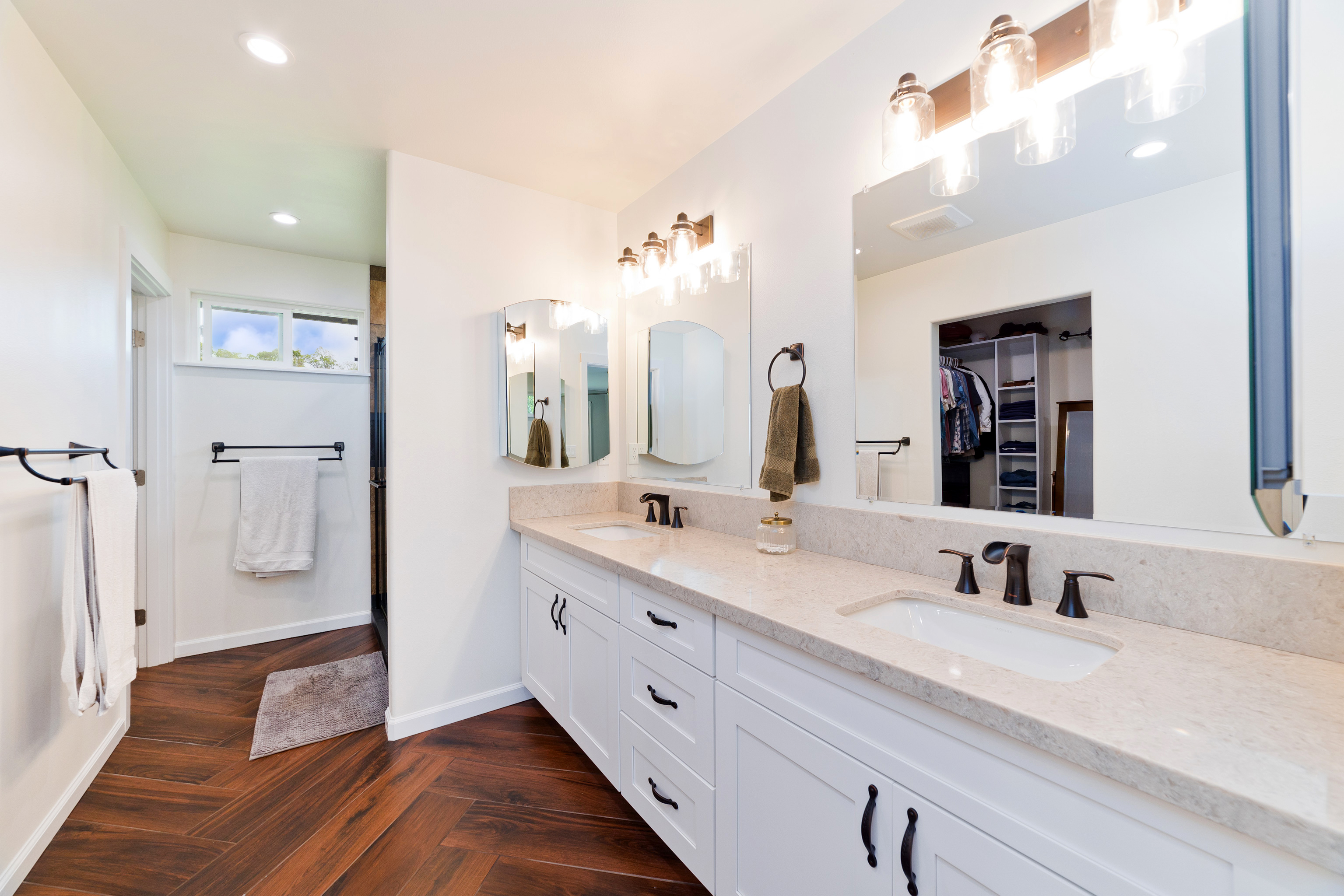 18-7970 North Lauko Road Mountain View, HI 96771 - Photo 22 of 30 a spacious bathroom with a double vanity sink and mirror
