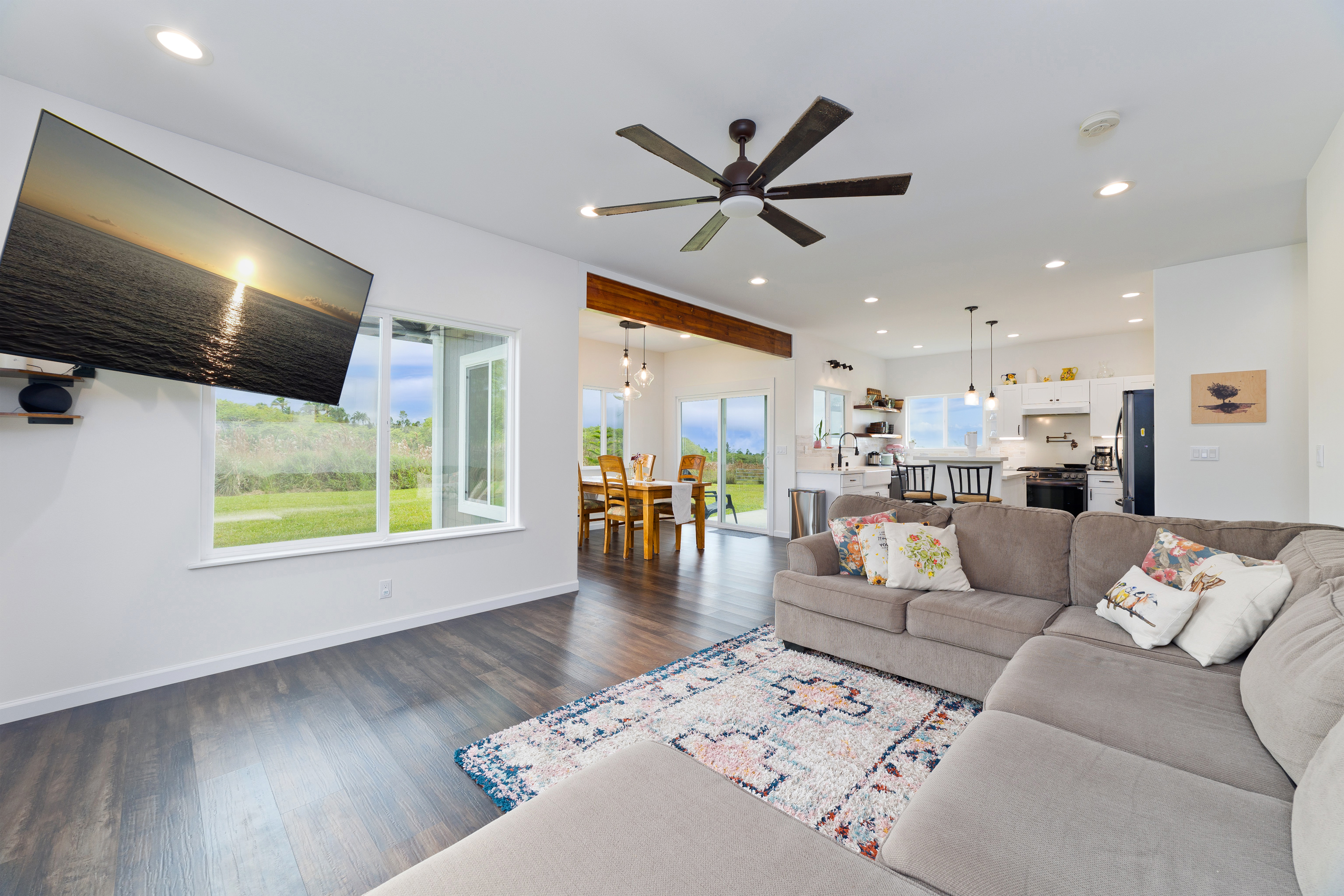 18-7970 North Lauko Road Mountain View, HI 96771 - Photo 8 of 30 a living room with furniture and a flat screen tv