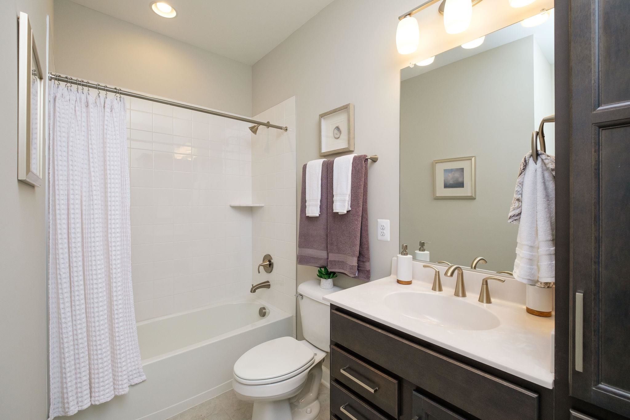 2905 Rutlege Road Harrisonburg, VA 22801 - Photo 16 of 24 a bathroom with a granite countertop sink toilet and shower