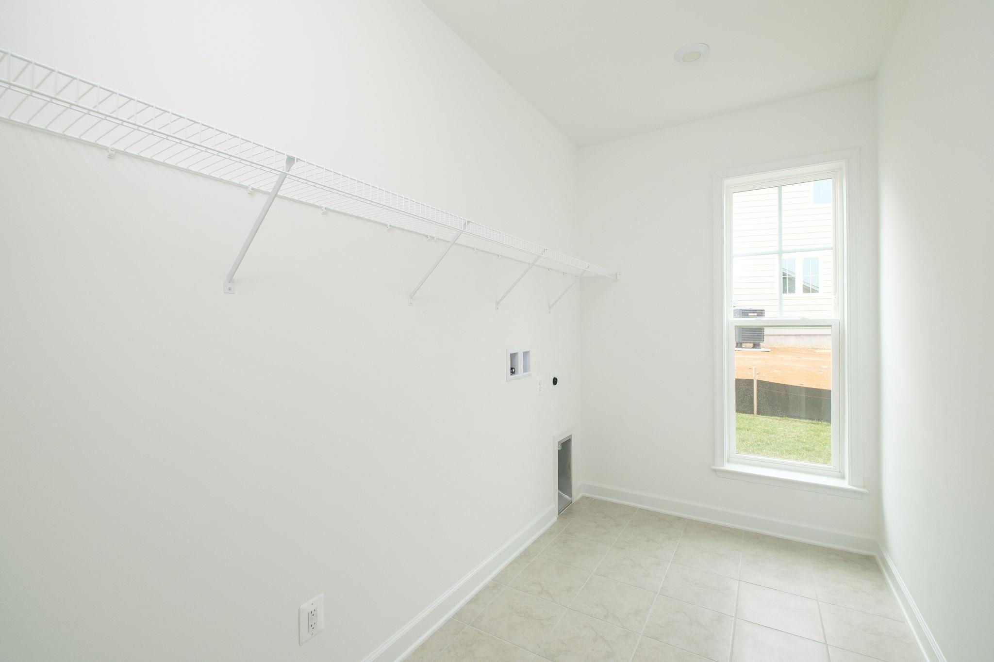 2905 Rutlege Road Harrisonburg, VA 22801 - Photo 19 of 24 a view of a small space with racks on the wall