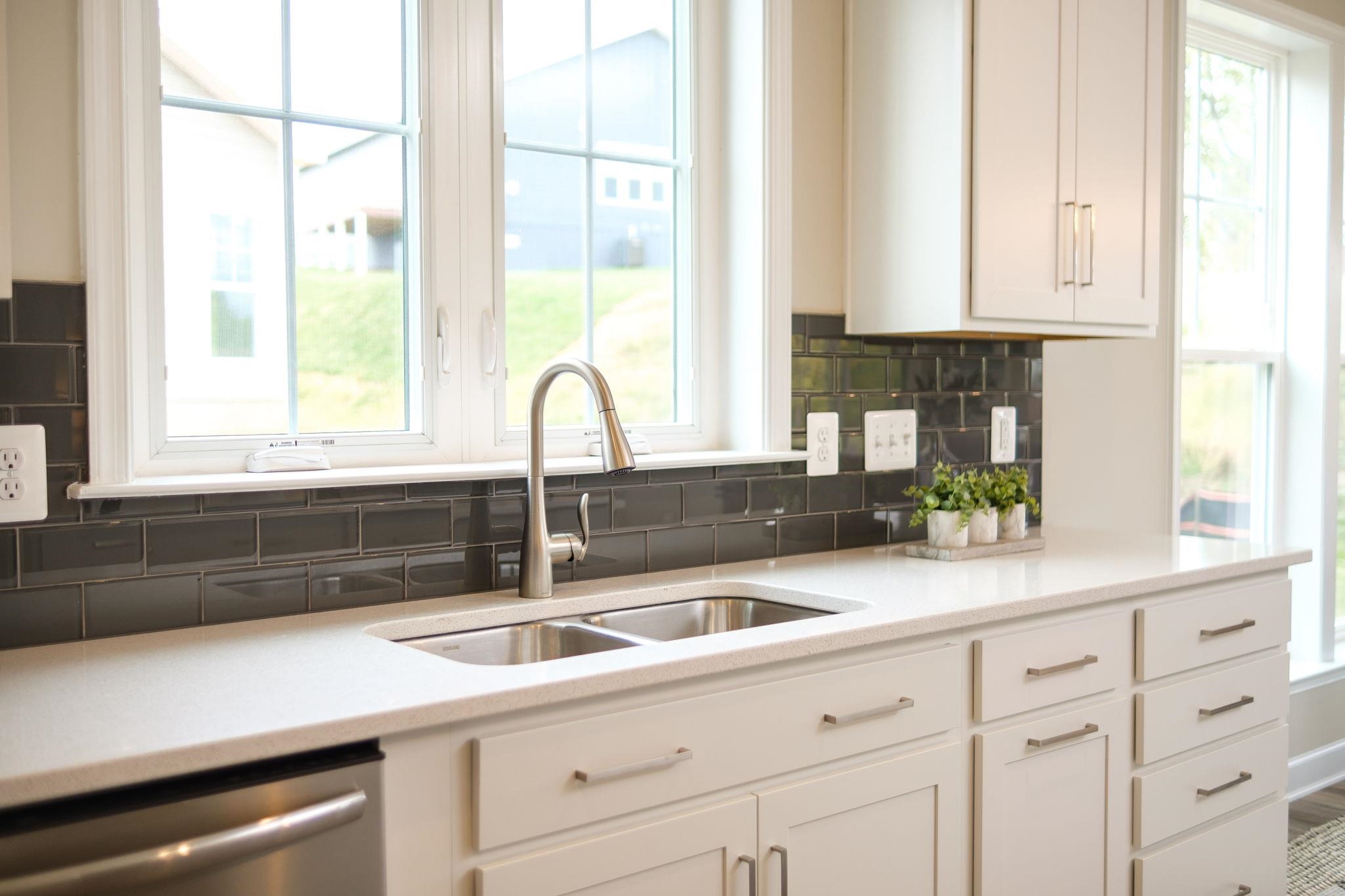 2905 Rutlege Road Harrisonburg, VA 22801 - Photo 6 of 24 a kitchen with granite countertop white cabinets and a window