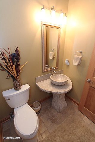 8001 East Tryon Grove Road Richmond, IL 60071 - Photo 18 of 24 a bathroom with a toilet sink and mirror