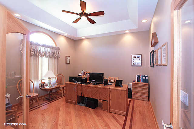 8001 East Tryon Grove Road Richmond, IL 60071 - Photo 10 of 24 a work room with furniture and wooden floor