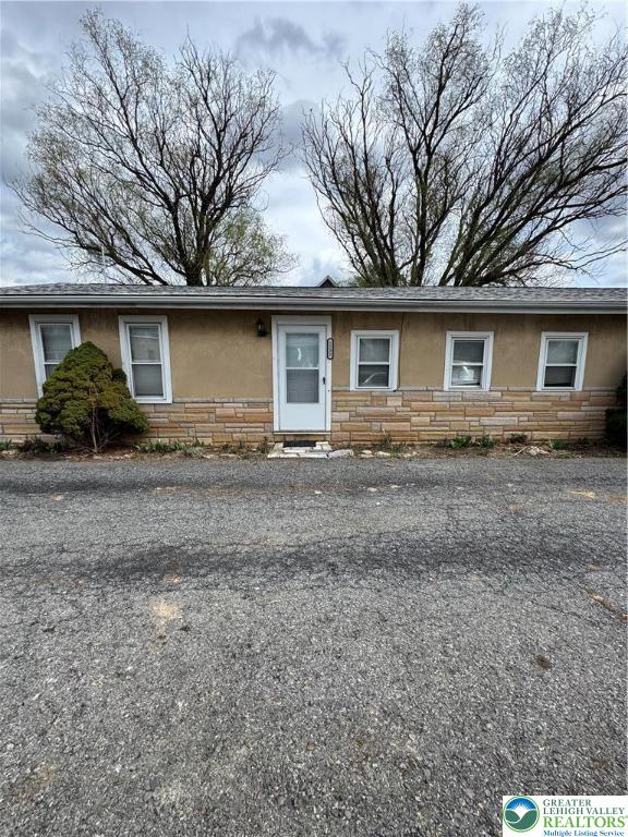 1232 South 9th Street, Unit REAR Allentown, PA 18103 - Photo 1 of 11 a front view of a house with garden