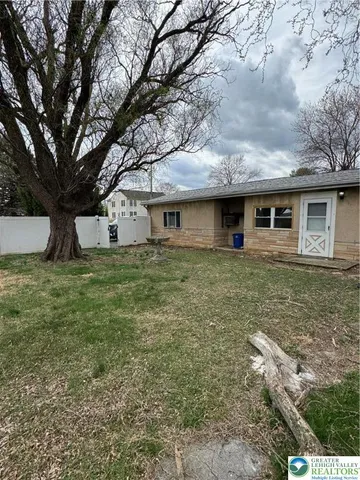 a house view with a garden space
