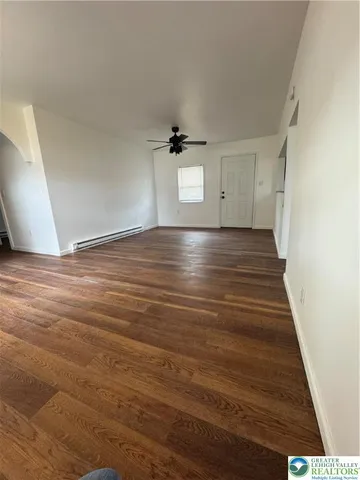 a view of an empty room and window