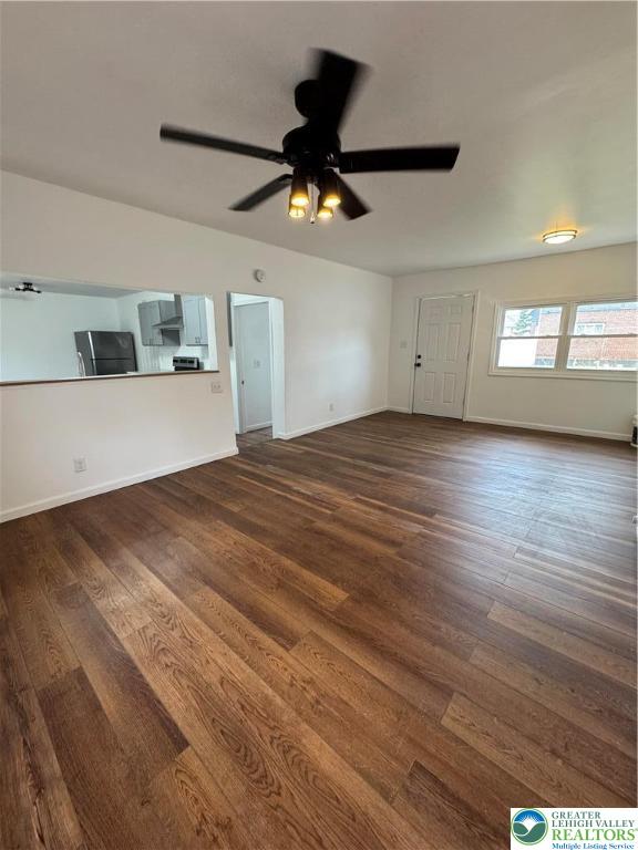1232 South 9th Street, Unit REAR Allentown, PA 18103 - Photo 6 of 11 a view of empty room with wooden floor and fan