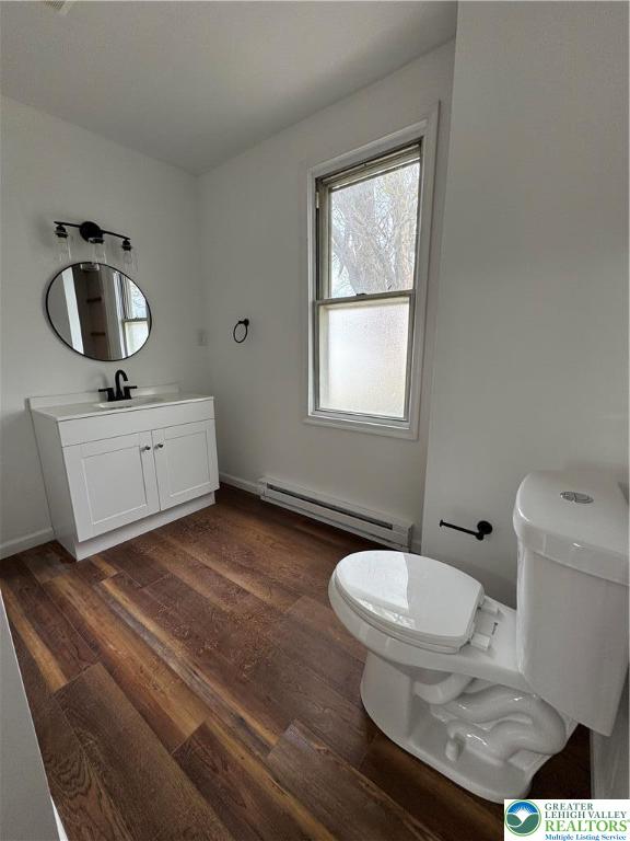 1232 South 9th Street, Unit REAR Allentown, PA 18103 - Photo 7 of 11 a bathroom with a toilet sink and mirror