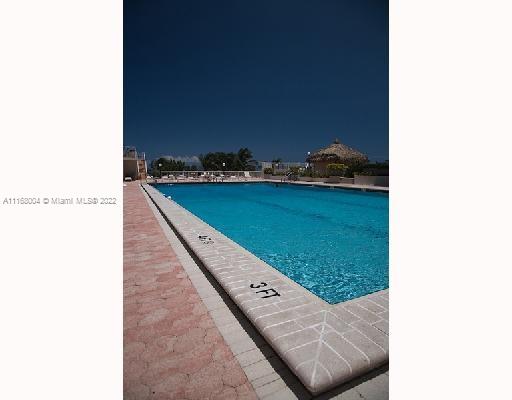 5401 Collins Avenue, Unit 833 Miami Beach, FL 33140 - Photo 20 of 25 a view of a living room with a rug