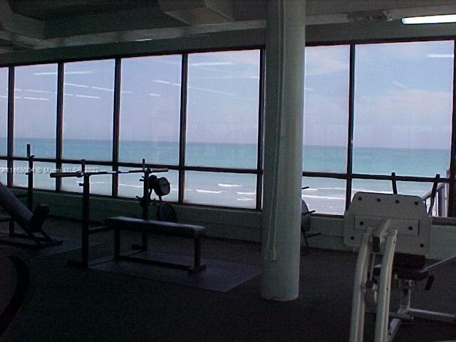 5401 Collins Avenue, Unit 833 Miami Beach, FL 33140 - Photo 24 of 25 a view of a balcony with chairs and a potted plant