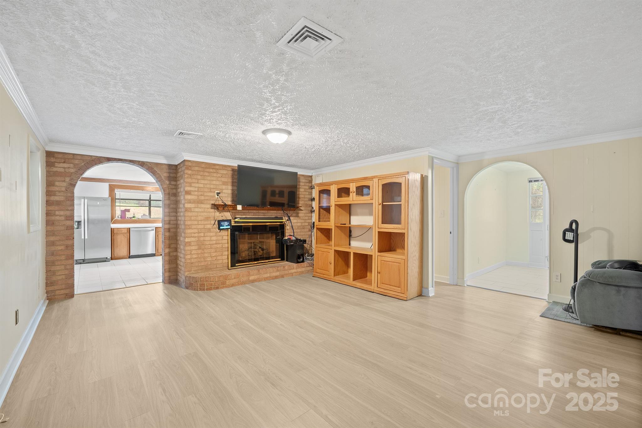 5260 Rifle Range Road Conover, NC 28613 - Photo 11 of 27 a view of an empty room with window and cabinet