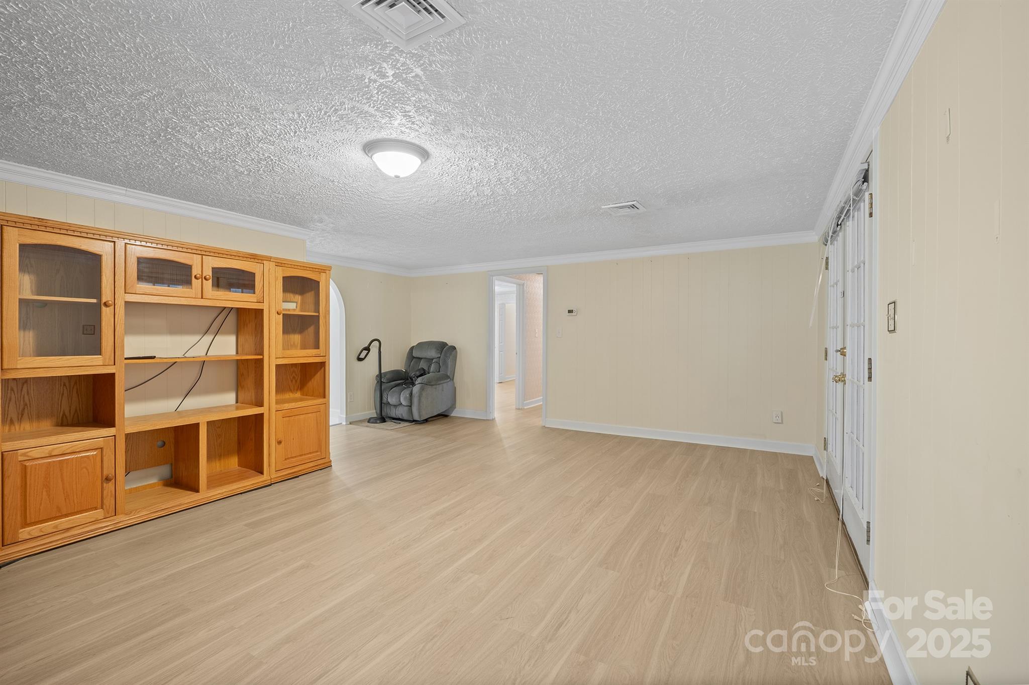 5260 Rifle Range Road Conover, NC 28613 - Photo 13 of 27 a view of an empty room with wooden floor and closet
