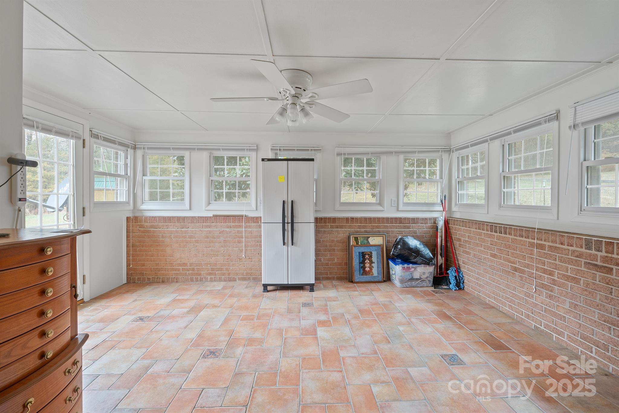 5260 Rifle Range Road Conover, NC 28613 - Photo 17 of 27 a view of livingroom with hardwood floor and a ceiling fan