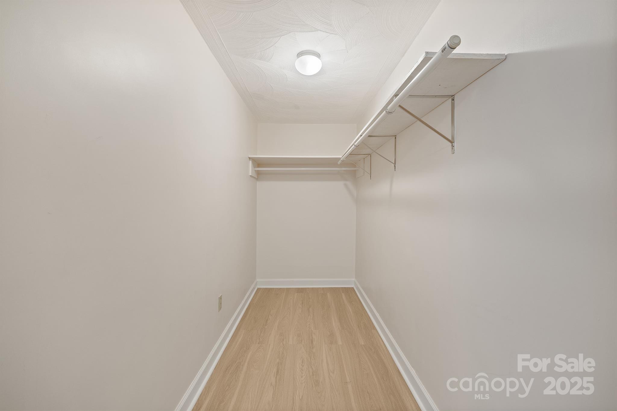 5260 Rifle Range Road Conover, NC 28613 - Photo 21 of 27 a view of a room with racks on the wall