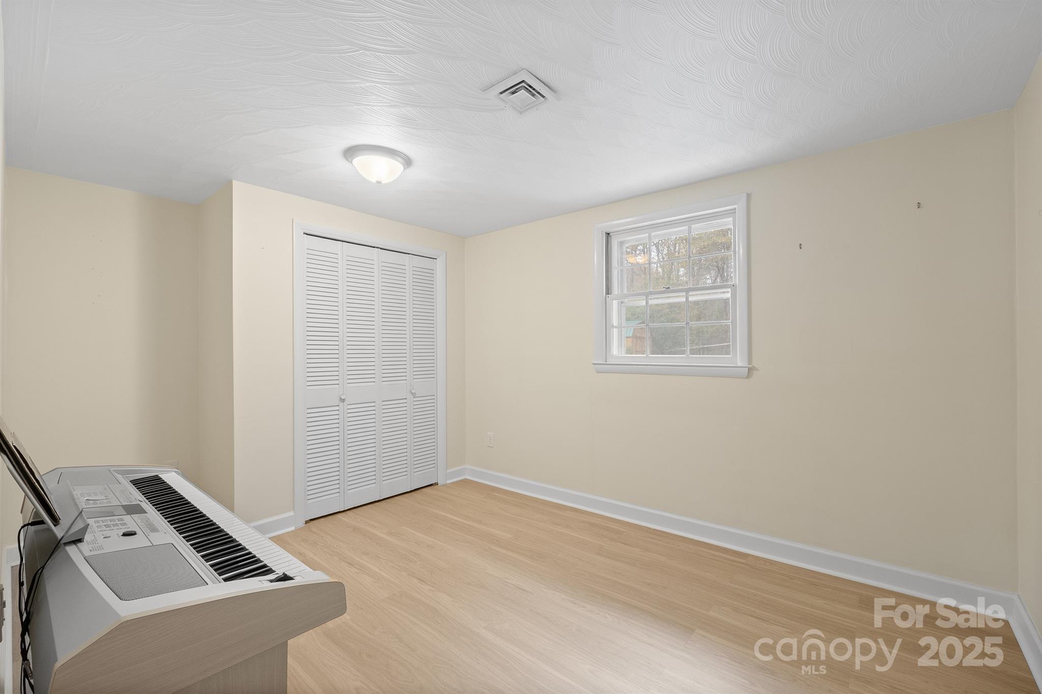 5260 Rifle Range Road Conover, NC 28613 - Photo 23 of 27 a view of a livingroom with wooden floor