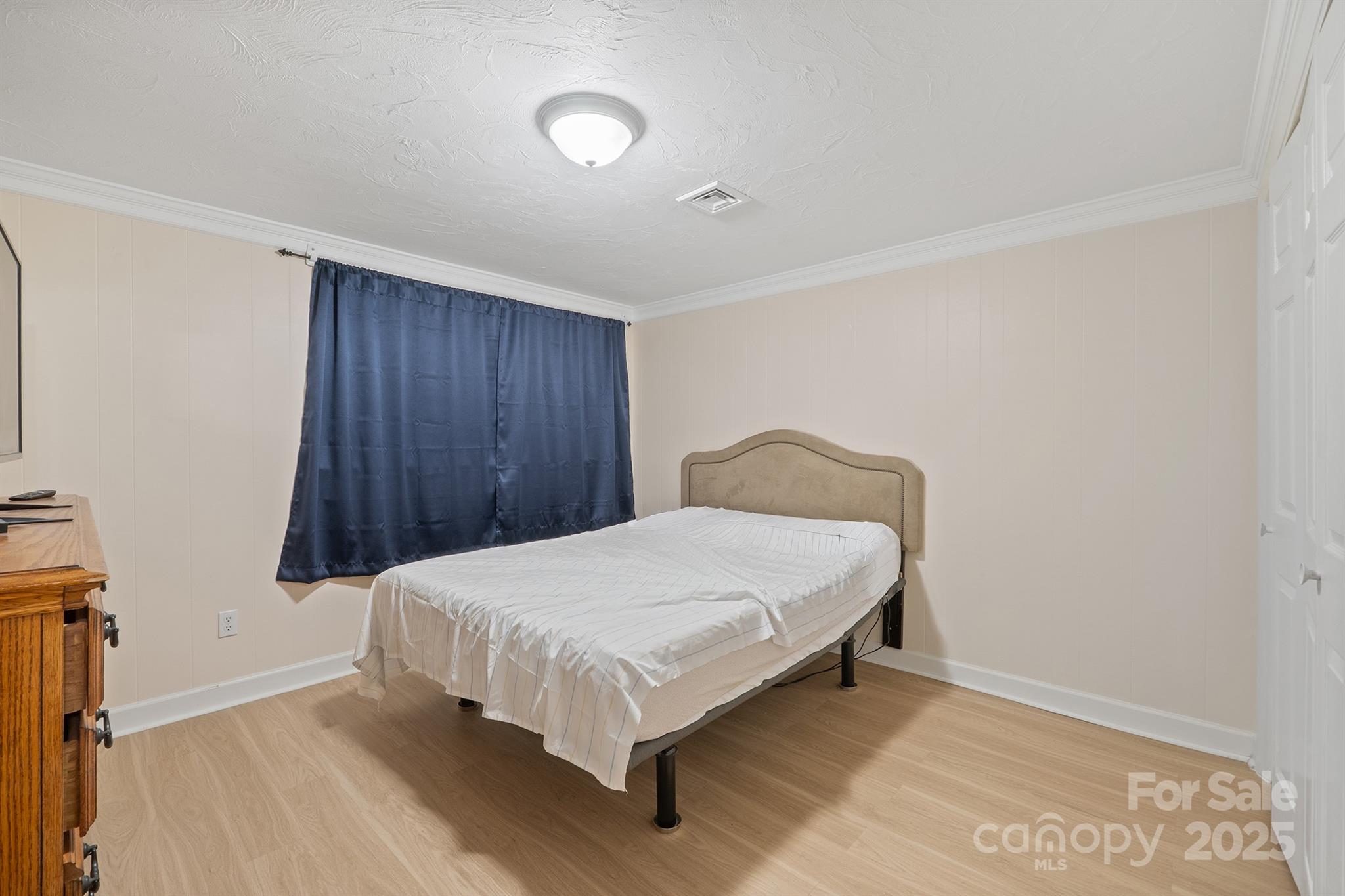 5260 Rifle Range Road Conover, NC 28613 - Photo 9 of 27 a bedroom with a bed and a window