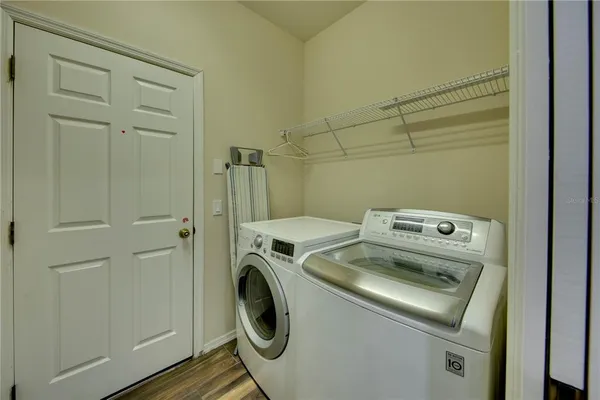 a utility room with dryer and washer