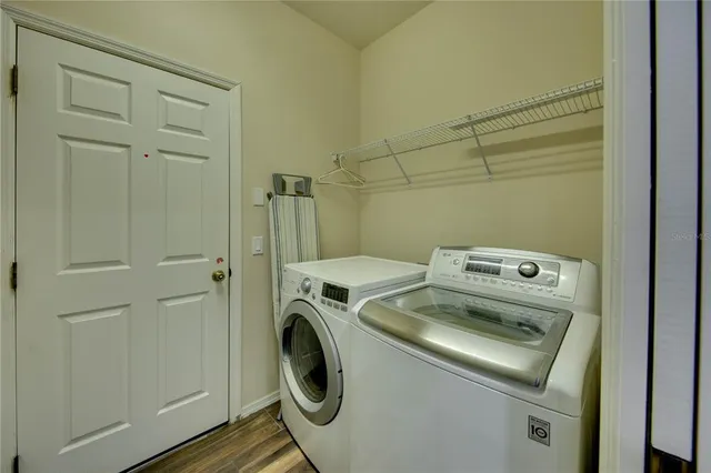 a utility room with dryer and washer