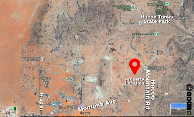 a view of roof with wooden floor and mountain view