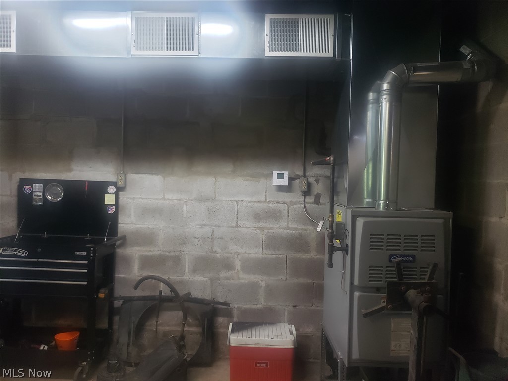 1214 Jacoby Road Akron, OH 44321 - Photo 25 of 35 3rd garage bay has a forced air gas furnace