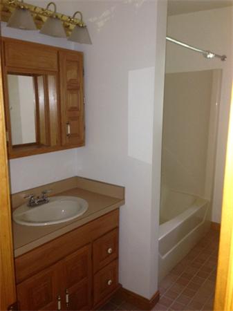 381 East County Road Rutland, MA 01543 - Photo 18 of 28 a bathroom with a sink and a mirror