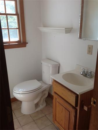 381 East County Road Rutland, MA 01543 - Photo 19 of 28 a bathroom with a sink toilet and a window