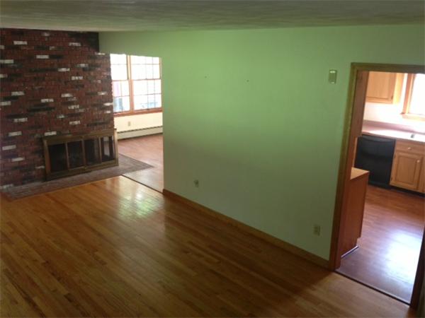 381 East County Road Rutland, MA 01543 - Photo 7 of 28 a view of an empty room with a window and wooden floor