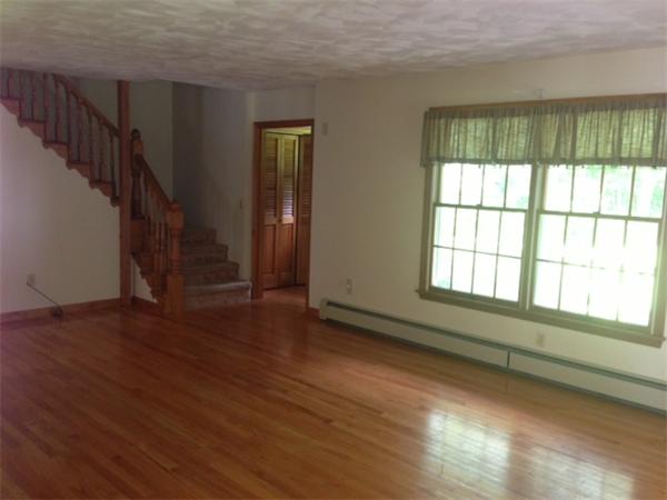 381 East County Road Rutland, MA 01543 - Photo 8 of 28 a view of an empty room with wooden floor and a window